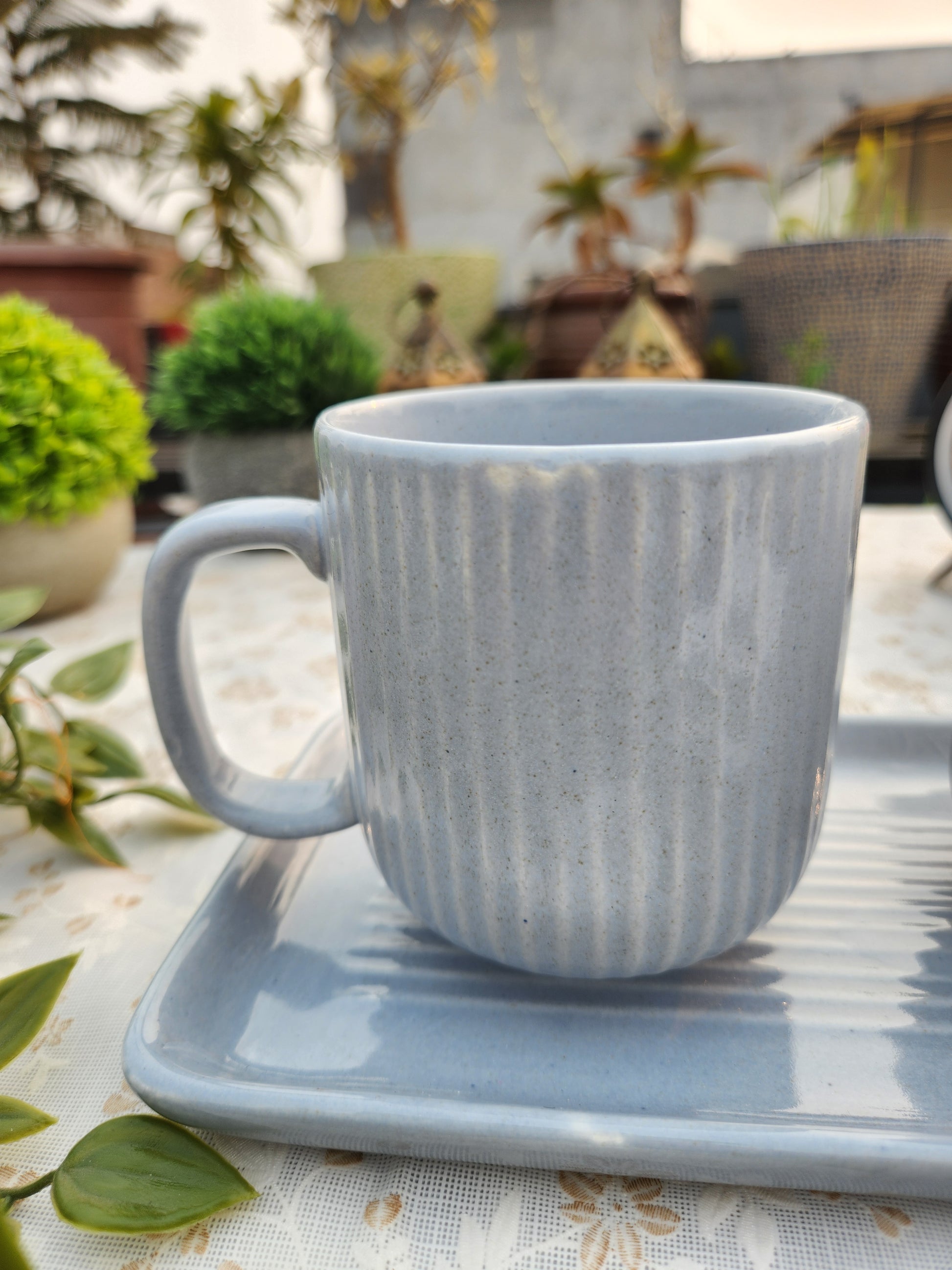 set of 3 ceramic coffee mugs with a tray