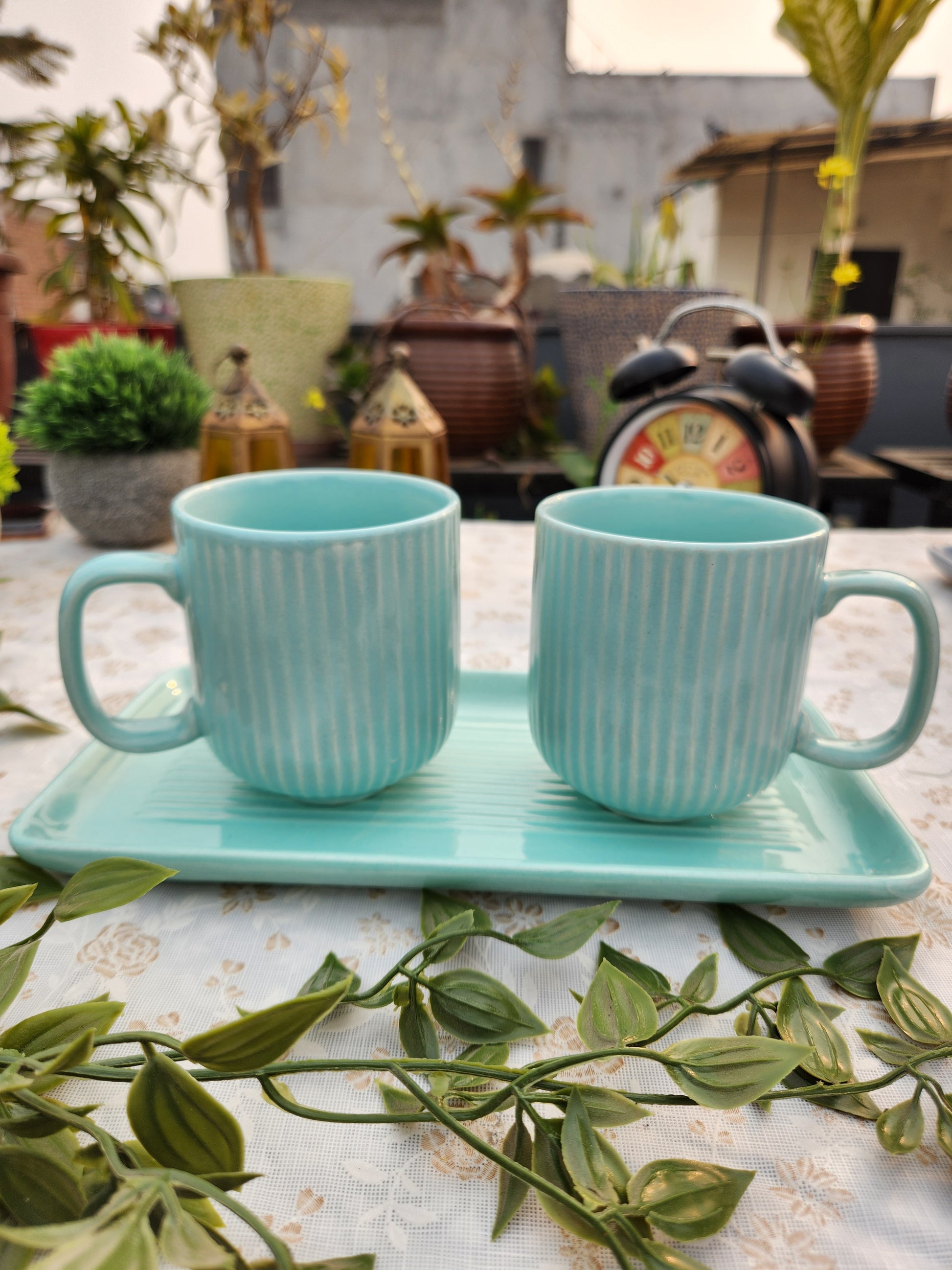 set of 3 ceramic coffee mugs with a tray