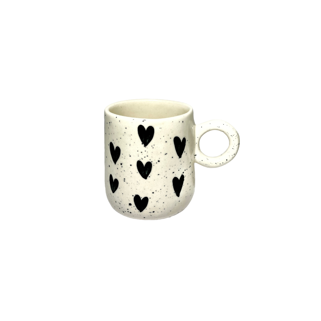 coffee mugs in black heart designs