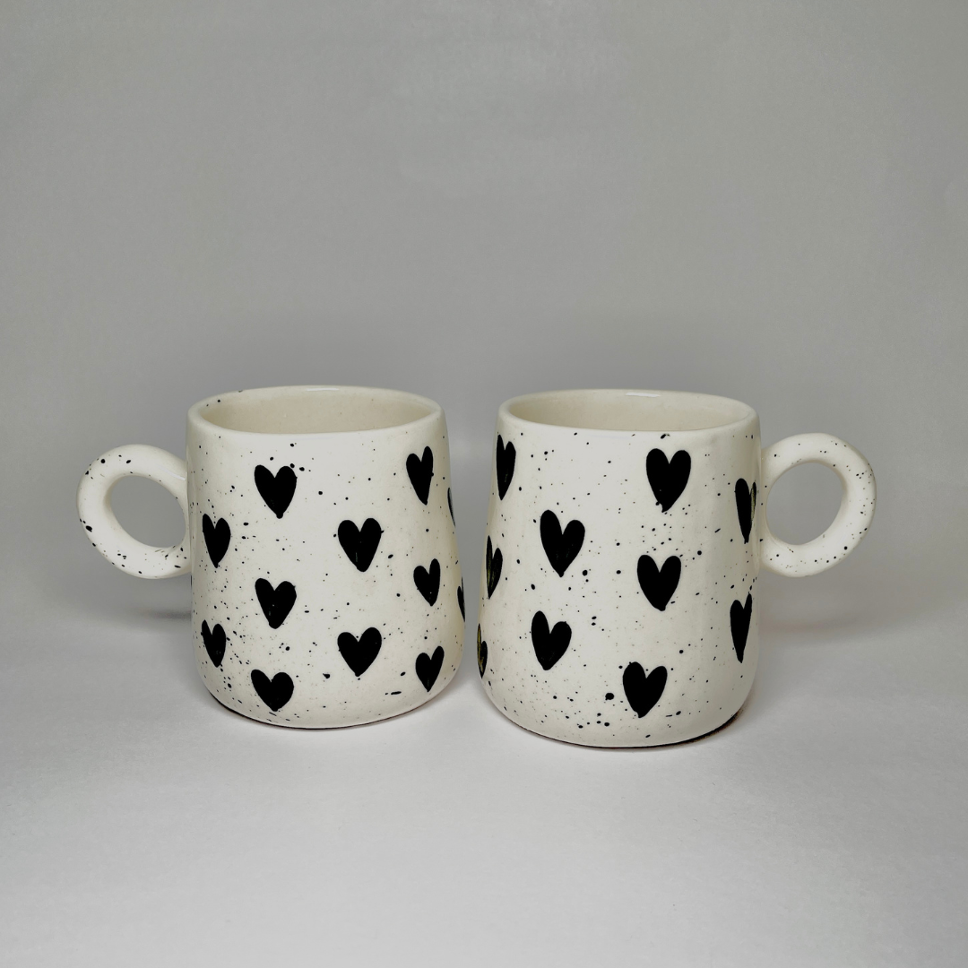 coffee mugs in black heart designs